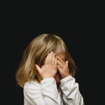 girl counting playing hide & seek