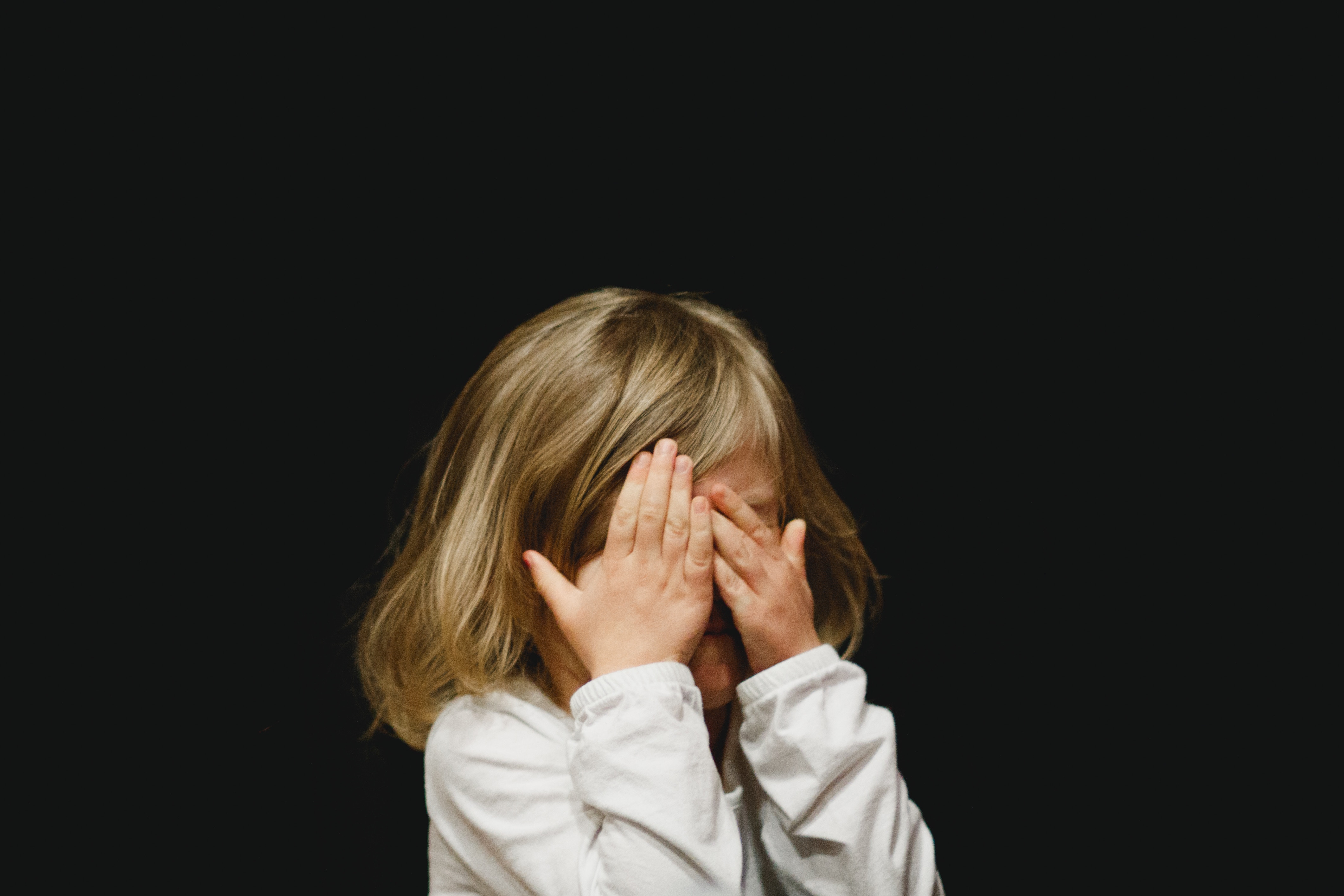 girl counting playing hide & seek